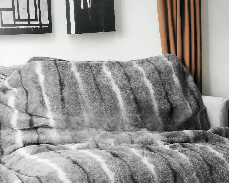 Recycled polyester blankets for an eco - conscious option50" X 70" Gray and White Faux Fur Striped Plush Throw Blanket