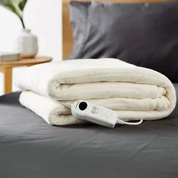 Cotton blankets for breathability and a lightweight feelElectric Heated Plush Cream Throw