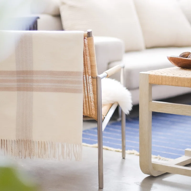 Linen blankets with a rustic and textured lookGeneva Ivory Taupe Throw by Pom Pom at Home