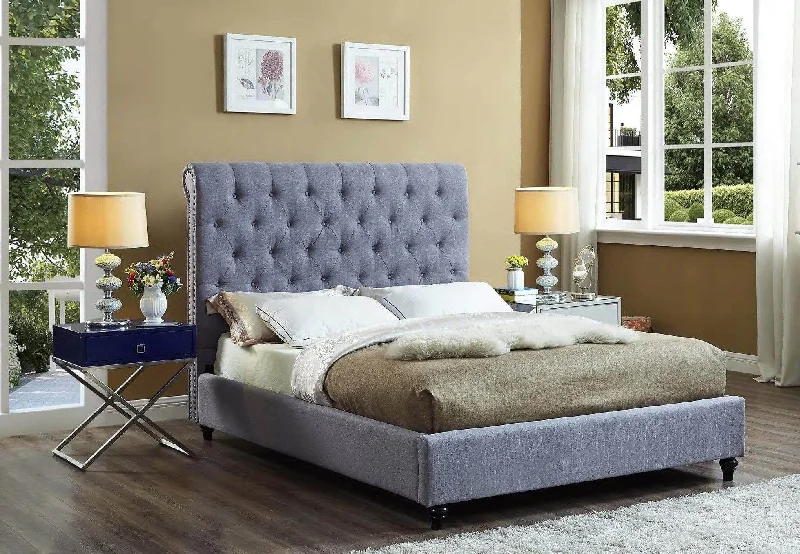 King - size mattresses for spacious master bedroomsGrey Fabric Bed with Nailhead